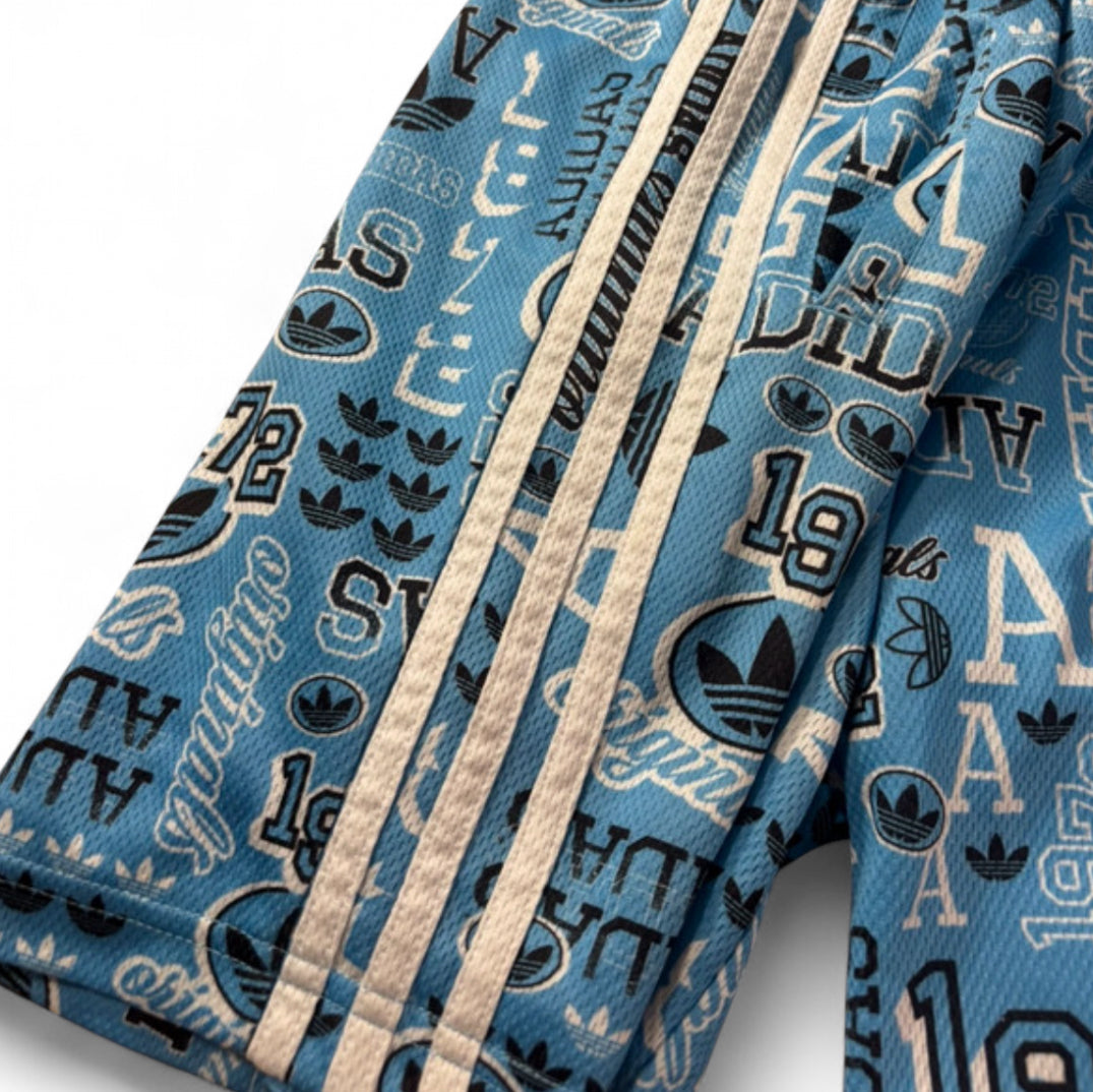 ADIDAS ORIGINALS 1972 MONOGRAM GRAPHIC MESH SHORTS - SKY BLUE 3 STRIPES